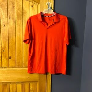 Men’s red Nike golf shirt